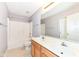 Bathroom features double sinks, a bathtub, and a mirror at 10580 Saddlestone Dr, Fishers, IN 46040