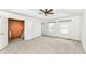 Large bedroom featuring carpet flooring and an open doorway to a staircase at 10580 Saddlestone Dr, Fishers, IN 46040