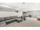Finished basement features a cozy sitting area and room for exercise equipment, perfect for relaxing and staying active at 11789 Langham Crescent Ct, Fishers, IN 46037