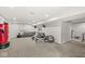 Finished basement offers space for recreation and exercise equipment, creating a versatile living area at 11789 Langham Crescent Ct, Fishers, IN 46037