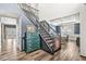 Grand foyer with staircase, hardwood floors, and an adjacent dining room at 11789 Langham Crescent Ct, Fishers, IN 46037