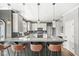 Kitchen featuring granite counters, white cabinets, stainless appliances, hardwood floors, and recessed lighting at 11789 Langham Crescent Ct, Fishers, IN 46037