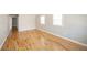 Bright bedroom with natural light and beautiful hardwood floors at 1219 Fairfax St, Anderson, IN 46012