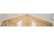 A bedroom's light hardwood floors and white trim provide a clean, modern aesthetic at 1219 Fairfax St, Anderson, IN 46012