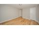 Bedroom shows light hardwood floors, doors and neutral wall color at 1219 Fairfax St, Anderson, IN 46012