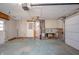 Garage shows washer/dryer hookups, concrete floors, and a water heater at 1219 Fairfax St, Anderson, IN 46012