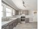 Modern kitchen with stainless steel appliances and stylish countertops at 1219 Fairfax St, Anderson, IN 46012