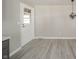 Stylish flooring complements the neutral paint and natural light at 1219 Fairfax St, Anderson, IN 46012