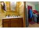 Rustic bathroom featuring a wooden vanity with a mirror and a sink creates a cozy and inviting atmosphere at 1243 S Morristown Pike, Greenfield, IN 46140