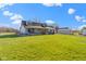 Charming property with a two-story home, expansive lawn and a serene, countryside ambiance with outbuildings at 1243 S Morristown Pike, Greenfield, IN 46140