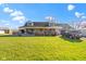 Inviting single-Gathering home with covered porch, attached garage and ample parking on a lush green lawn at 1243 S Morristown Pike, Greenfield, IN 46140
