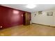 Inviting living room with warm hardwood floors and ample space, perfect for relaxation and entertaining at 1243 S Morristown Pike, Greenfield, IN 46140