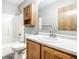 Bathroom with wood cabinet and shower over tub at 12702 Slippery Rock Rd, Indianapolis, IN 46236