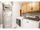 Modern laundry room with a set of front load washer and dryer at 12702 Slippery Rock Rd, Indianapolis, IN 46236