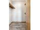A spacious walk-in closet with custom shelves and tile flooring at 12702 Slippery Rock Rd, Indianapolis, IN 46236