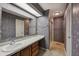 Vintage-style bathroom featuring a sink with a vanity and a shower, offering a nostalgic and functional space at 138 President W Trl, Indianapolis, IN 46229