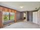 Bedroom with a large window and view of the backyard, offering plenty of natural light and a connection to the outdoors at 138 President W Trl, Indianapolis, IN 46229