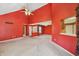 Spacious living room featuring high ceilings, a ceiling fan and neutral carpet at 138 President W Trl, Indianapolis, IN 46229