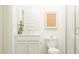 Fresh and clean bathroom with white cabinetry, toilet, and a glass-enclosed shower at 15371 Alperton Rd, Fishers, IN 46037