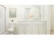Bright bathroom featuring a double sink vanity with modern fixtures and a clean, neutral color scheme at 15371 Alperton Rd, Fishers, IN 46037