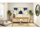 Bright home office features a wooden desk, comfortable chair, and stylish decor at 15371 Alperton Rd, Fishers, IN 46037