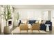 Cozy living room area featuring a fireplace, comfortable seating, and stylish decor at 15371 Alperton Rd, Fishers, IN 46037