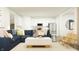 Bright and spacious open concept living room with an accent couch and modern furnishings at 15371 Alperton Rd, Fishers, IN 46037