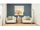 Cozy sitting area with comfortable chairs, a stylish table, and elegant decor at 15371 Alperton Rd, Fishers, IN 46037