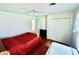 A well-lit bedroom boasts two twin beds, closet and an ensuite bathroom at 1711 Lafayette Ave # 5, Lebanon, IN 46052