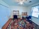 This bedroom includes a ceiling fan, wood floors, 2 desks and a closet at 1711 Lafayette Ave # 5, Lebanon, IN 46052