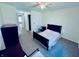 Bedroom with ceiling fan and neutral carpet at 1711 Lafayette Ave # 5, Lebanon, IN 46052