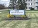 Community sign for Eden Garden Homes Condominium Living with manicured landscaping at 1711 Lafayette Ave # 5, Lebanon, IN 46052