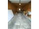 Spacious garage interior, ready for storage with a back door entrance at 1711 Lafayette Ave # 5, Lebanon, IN 46052