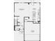 An open floor plan with a kitchen, dining area, great room, garage, and covered porch at 1956 Black Oak Dr, Shelbyville, IN 46176