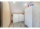 Practical laundry area features a washer, dryer, and refrigerator for added convenience at 222 Stony Ln, Noblesville, IN 46060