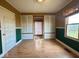 Bedroom with hardwood floors, trim, a window and two closets, with built in cabinets at 2275 N 250 E, Lebanon, IN 46052