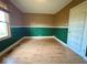 Bedroom features hardwood floors, trim and large window providing great natural light at 2275 N 250 E, Lebanon, IN 46052