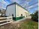 Large garage with multiple roll-up doors, offering ample space for parking, storage, or workshop area at 2275 N 250 E, Lebanon, IN 46052