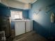 Laundry room with washer, dryer, utility sink and small window at 2275 N 250 E, Lebanon, IN 46052