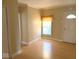 Bright living room featuring wood floors, neutral paint, and a large window, creating a cozy space at 2275 N 250 E, Lebanon, IN 46052