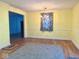 Bright living room features hardwood floors, modern lighting, and decorative half wall molding at 2275 N 250 E, Lebanon, IN 46052