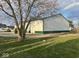 A metal outbuilding situated on a grassy lot at 2275 N 250 E, Lebanon, IN 46052