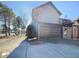 Inviting home with a two-car garage and appealing curb appeal and well maintained landscaping at 2632 Frasier Fir Dr, Greenwood, IN 46143