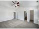 Spacious main bedroom featuring a ceiling fan, and ensuite bathroom with walk in closet at 2632 Frasier Fir Dr, Greenwood, IN 46143