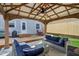 The backyard boasts a deck, lounge area, and well-maintained grass, perfect for relaxation at 304 W 43Rd St, Indianapolis, IN 46208