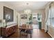 Dining room with hardwood floors, dining table, and sideboard at 304 W 43Rd St, Indianapolis, IN 46208
