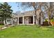 Exterior view of home with a front yard and covered front porch with columns at 304 W 43Rd St, Indianapolis, IN 46208