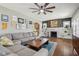 Spacious living room showcases hardwood flooring, fireplace, and open shelving at 304 W 43Rd St, Indianapolis, IN 46208