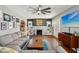 Living room features hardwood floors, a fireplace, and access to the front patio at 304 W 43Rd St, Indianapolis, IN 46208