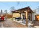 Backyard featuring a deck, lounge area, and privacy screen for a relaxing outdoor experience at 304 W 43Rd St, Indianapolis, IN 46208